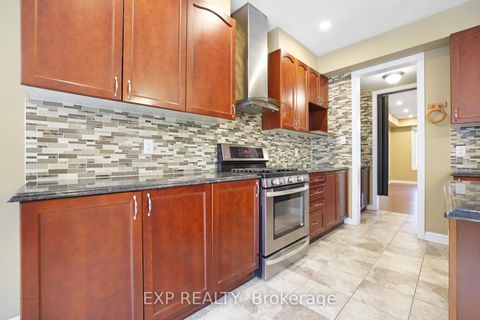 Photo 9 at 210 Rivertree Street, Emerald Meadows/Trailwest, Kanata