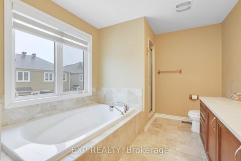 Photo 14 at 210 Rivertree Street, Emerald Meadows/Trailwest, Kanata