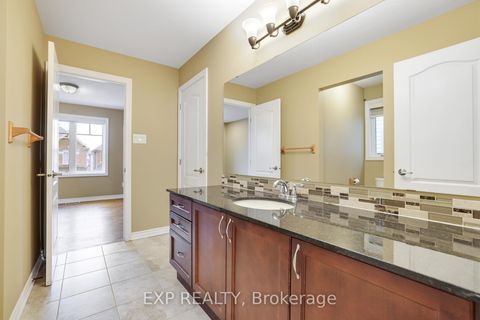 Photo 17 at 210 Rivertree Street, Emerald Meadows/Trailwest, Kanata