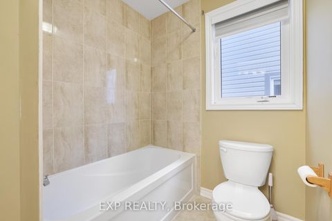 Photo 19 at 210 Rivertree Street, Emerald Meadows/Trailwest, Kanata