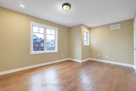 Photo 22 at 210 Rivertree Street, Emerald Meadows/Trailwest, Kanata