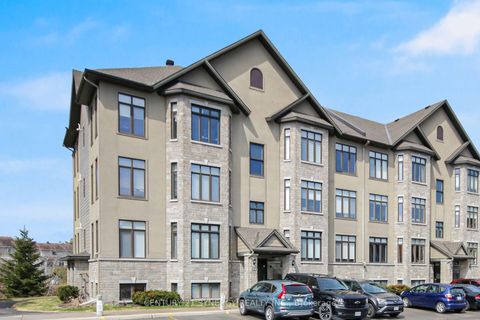 Photo 1 at 7 - 50 Prestige Circle, Chatelaine Village, Orleans