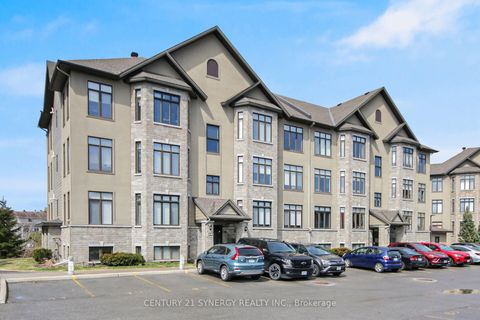 Photo 2 at 7 - 50 Prestige Circle, Chatelaine Village, Orleans