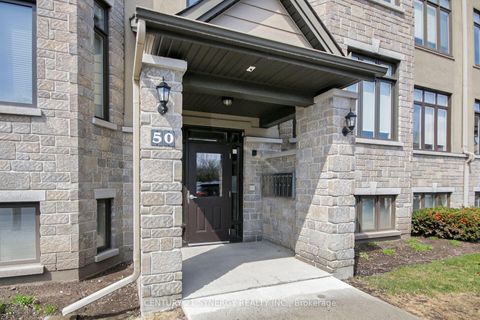 Photo 3 at 7 - 50 Prestige Circle, Chatelaine Village, Orleans