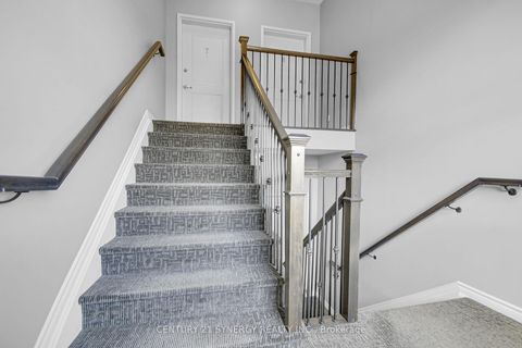 Photo 4 at 7 - 50 Prestige Circle, Chatelaine Village, Orleans