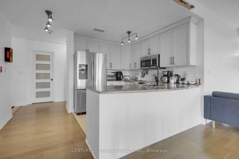 Photo 7 at 7 - 50 Prestige Circle, Chatelaine Village, Orleans