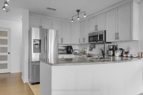 Photo 8 at 7 - 50 Prestige Circle, Chatelaine Village, Orleans