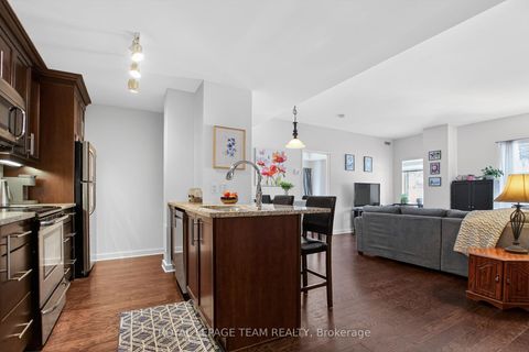 Photo 5 at 204 - 310 Centrum Boulevard, Bilberry Creek/Queenswood Heights, Orleans