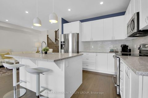 Photo 2 at 225 Rivertree Street, Emerald Meadows/Trailwest, Kanata