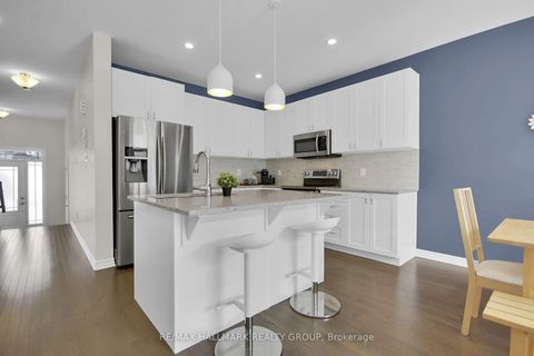 Photo 4 at 225 Rivertree Street, Emerald Meadows/Trailwest, Kanata