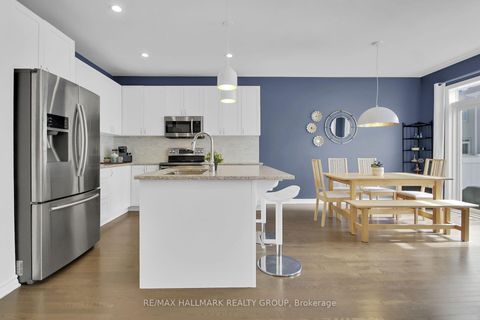 Photo 5 at 225 Rivertree Street, Emerald Meadows/Trailwest, Kanata