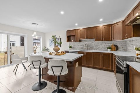 Photo 18 at 122 Cranesbill Road, Emerald Meadows/Trailwest, Kanata