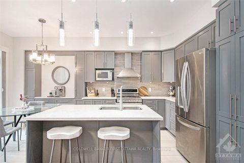 Photo 4 at 427 Rainrock Crescent, Mer Bleue/Bradley Estates/Anderson Park, Orleans