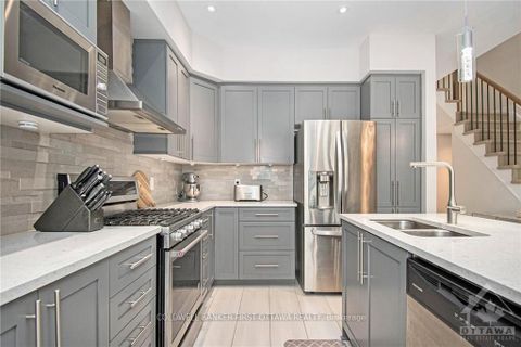 Photo 5 at 427 Rainrock Crescent, Mer Bleue/Bradley Estates/Anderson Park, Orleans