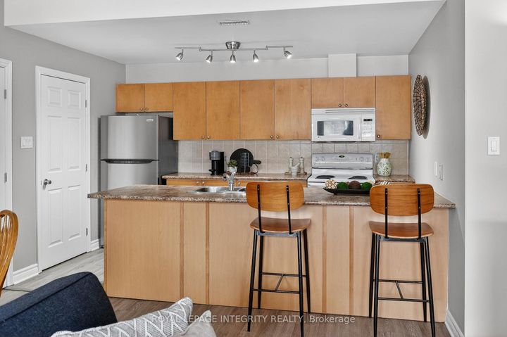 Photo 8 at E - 156 Waterbridge Drive, Nepean (Barrhaven East), Ottawa