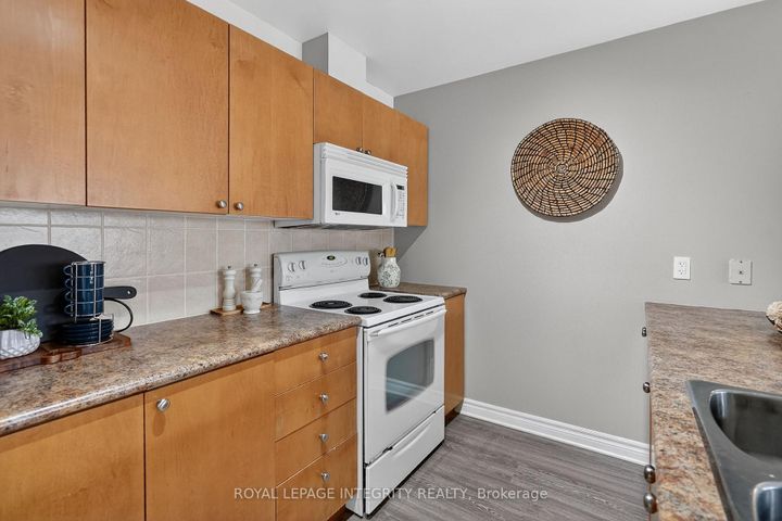 Photo 10 at E - 156 Waterbridge Drive, Nepean (Barrhaven East), Ottawa