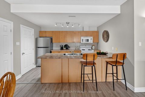 Photo 7 at E - 156 Waterbridge Drive, Nepean (Barrhaven East), Ottawa