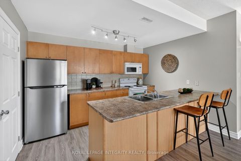 Photo 9 at E - 156 Waterbridge Drive, Nepean (Barrhaven East), Ottawa