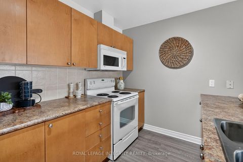 Photo 10 at E - 156 Waterbridge Drive, Nepean (Barrhaven East), Ottawa