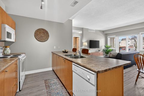 Photo 11 at E - 156 Waterbridge Drive, Nepean (Barrhaven East), Ottawa
