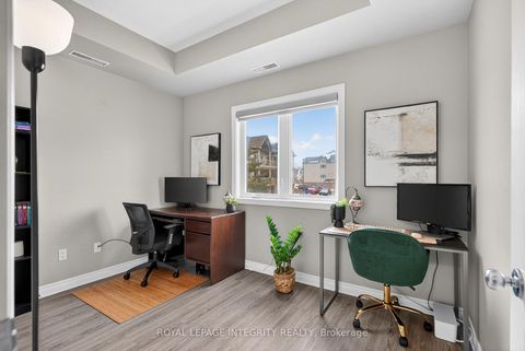 Photo 17 at E - 156 Waterbridge Drive, Nepean (Barrhaven East), Ottawa