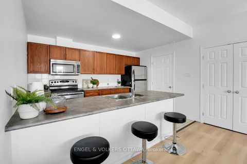 Photo 5 at 5 - 165 Waterbridge Drive, Nepean (Barrhaven East), Ottawa
