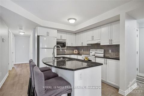 Photo 3 at 2 - 46 Barnstone Drive, Nepean (Barrhaven East), Ottawa