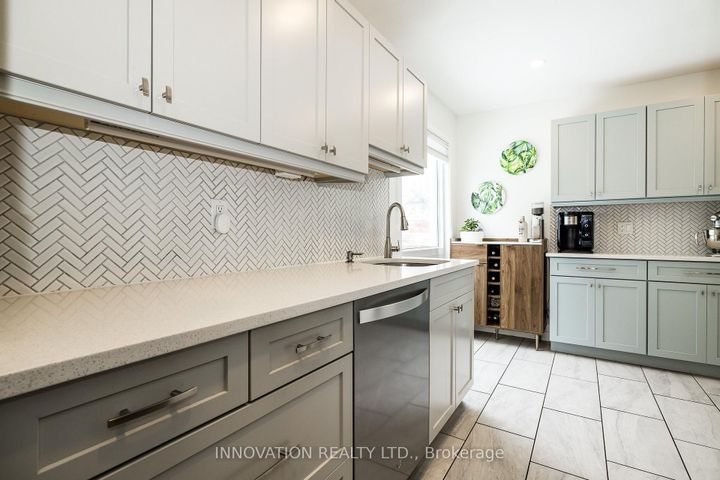 Photo 11 at 128 Pickwick Drive, Nepean (Cedargrove/Fraserdale), Ottawa