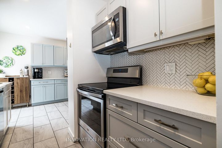 Photo 12 at 128 Pickwick Drive, Nepean (Cedargrove/Fraserdale), Ottawa
