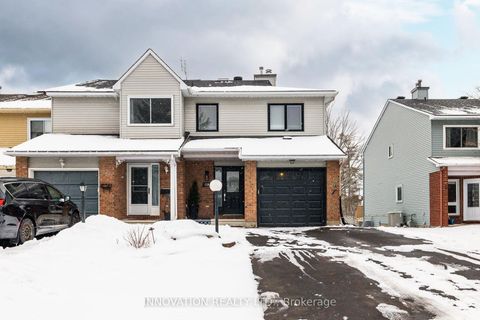 Photo 1 at 128 Pickwick Drive, Nepean (Cedargrove/Fraserdale), Ottawa