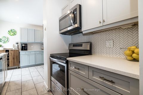 Photo 12 at 128 Pickwick Drive, Nepean (Cedargrove/Fraserdale), Ottawa