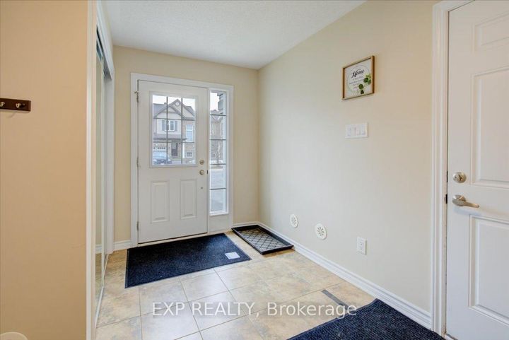 Photo 2 at 461 MEADOWHAWK Crescent, Nepean (Half Moon Bay), Ottawa