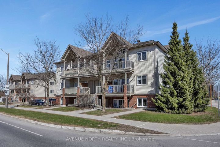 Photo 1 at 4 - 175 Waterbridge Drive, Nepean (Barrhaven East), Ottawa