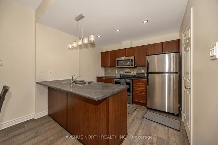 Photo 12 at 4 - 175 Waterbridge Drive, Nepean (Barrhaven East), Ottawa