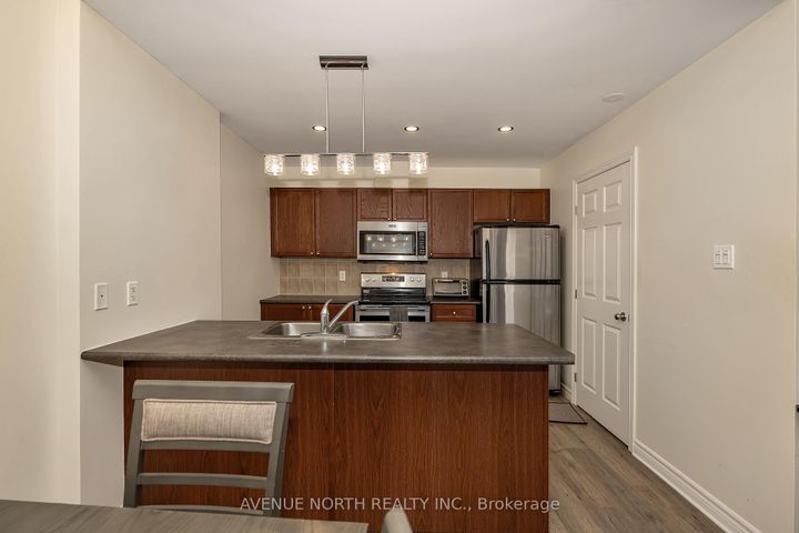 Photo 13 at 4 - 175 Waterbridge Drive, Nepean (Barrhaven East), Ottawa