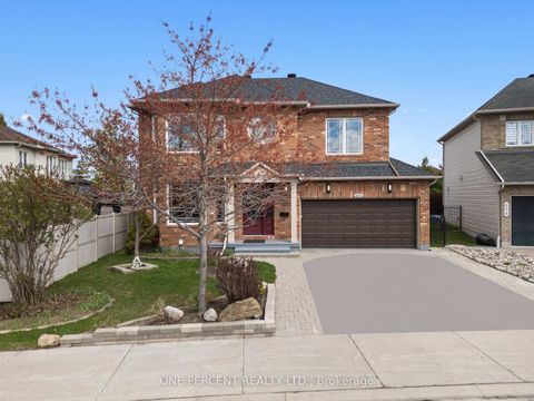 Photo 2 at 860 Taradale Drive, Nepean (Strandherd), Ottawa