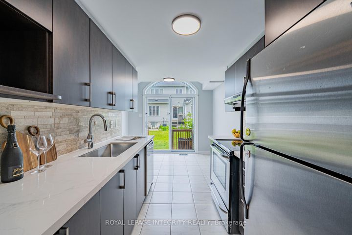 Photo 11 at 132 Mancini Way E, Nepean (Strandherd), Ottawa