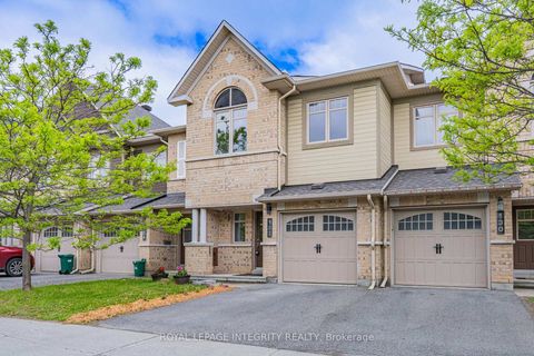 Photo 1 at 132 Mancini Way E, Nepean (Strandherd), Ottawa