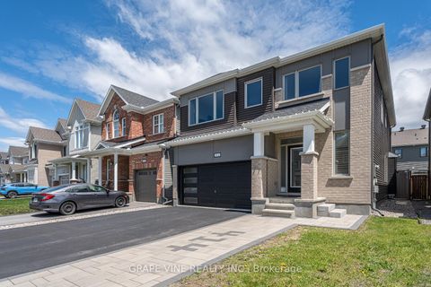 Photo 1 at 414 Aphelion Crescent, Nepean (Half Moon Bay), Ottawa