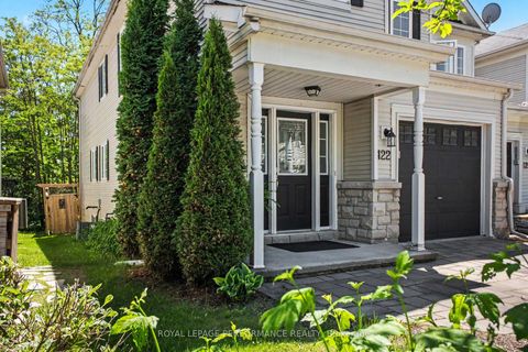 Photo 1 at 122 Rustwood Private, Nepean (Stonebridge), Ottawa