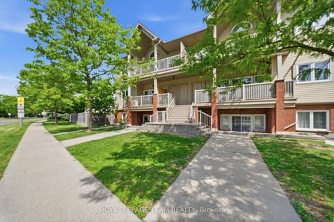 Photo 1 at 9 - 165 Waterbridge Drive, Nepean (Barrhaven East), Ottawa