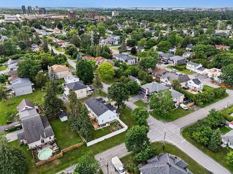 Photo 1 at 50 Lotta Avenue W, Nepean (Meadowlands/St. Claire Gardens), Ottawa