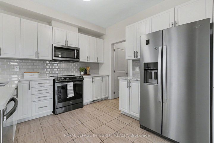 Photo 8 at 301 Cloyne Crescent, Nepean (Half Moon Bay), Ottawa