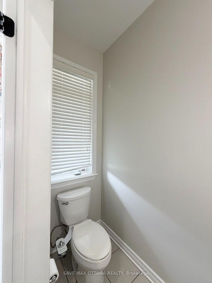 Photo 2 at 100 Popplewell Crescent S, Nepean (Cedargrove/Fraserdale), Ottawa