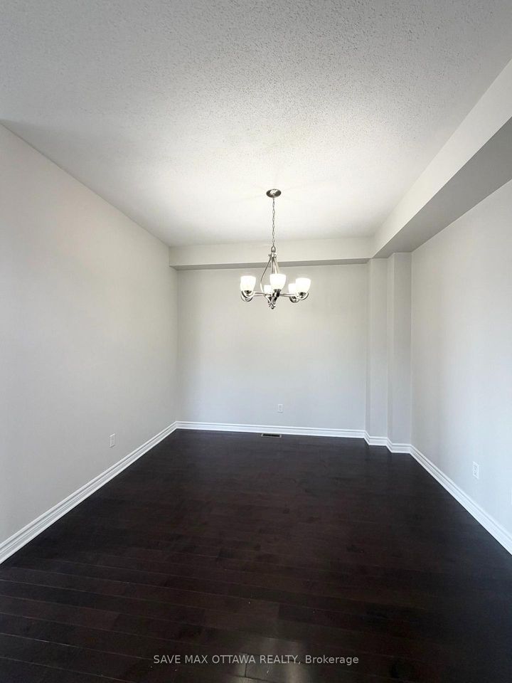 Photo 5 at 100 Popplewell Crescent S, Nepean (Cedargrove/Fraserdale), Ottawa