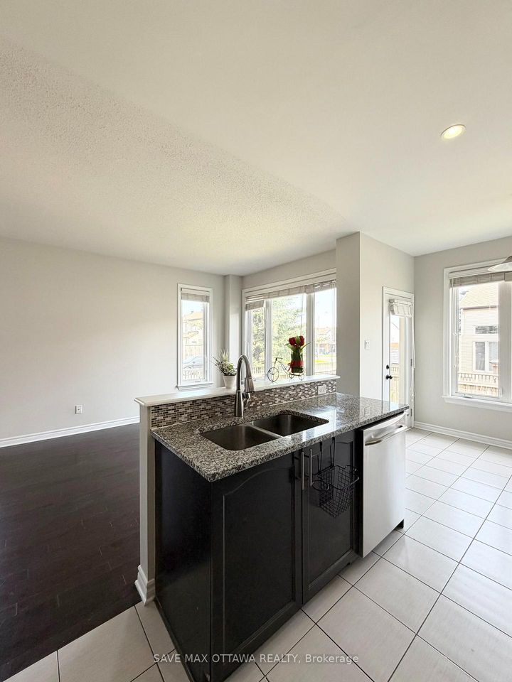 Photo 10 at 100 Popplewell Crescent S, Nepean (Cedargrove/Fraserdale), Ottawa