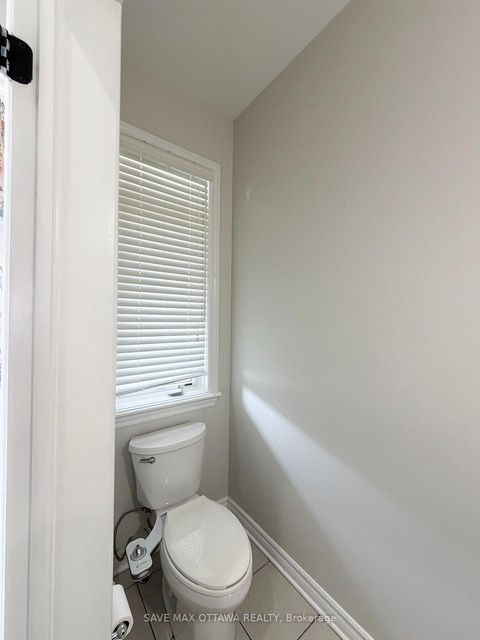 Photo 2 at 100 Popplewell Crescent S, Nepean (Cedargrove/Fraserdale), Ottawa