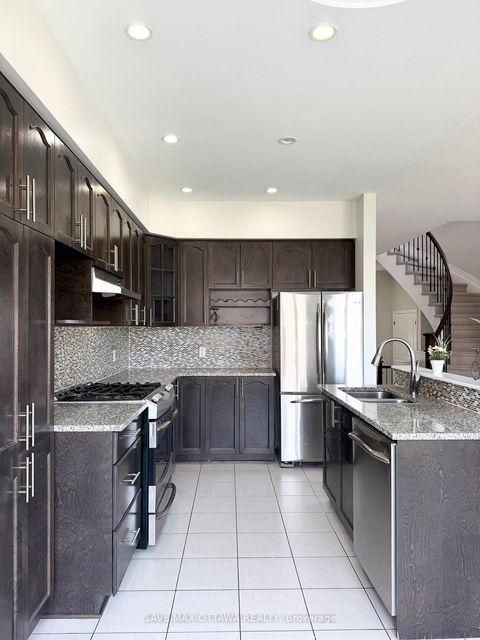 Photo 8 at 100 Popplewell Crescent S, Nepean (Cedargrove/Fraserdale), Ottawa