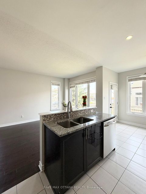 Photo 10 at 100 Popplewell Crescent S, Nepean (Cedargrove/Fraserdale), Ottawa