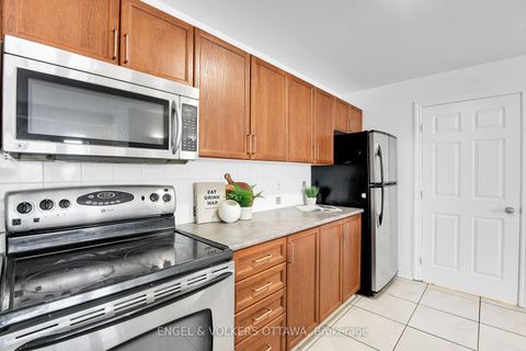 Photo 3 at 5 - 165 Waterbridge Drive, Nepean (Barrhaven East), Ottawa